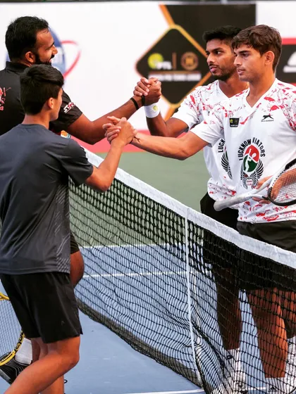 A moment of sportsmanship at the Pro Tennis League. Our players learn to compete hard and respect their opponents.