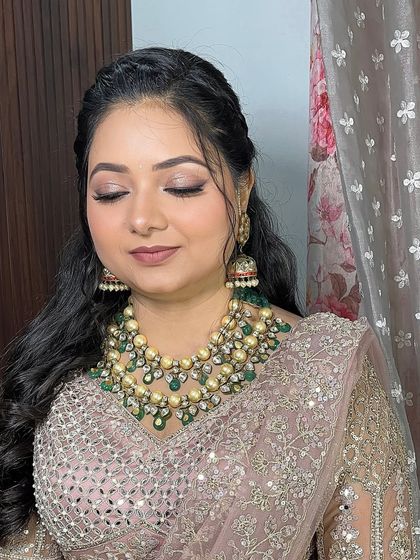 A close-up of the eye makeup. I used a blend of matte and shimmer eyeshadows to create soft definition that makes the eyes pop without being overpowering.