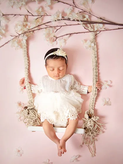 This precious moment is what I love to create. A beautiful, styled portrait of your newborn, sleeping so peacefully, creates a timeless piece of art for your family to cherish forever.