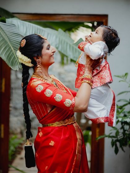A precious moment between mother and son. My makeup is designed to be long-lasting and comfortable for these special family events.