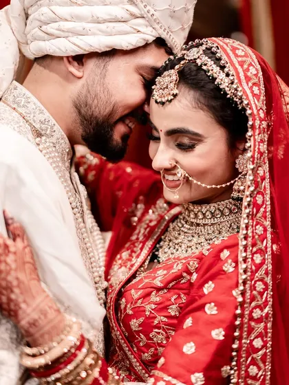 Finding a quiet moment of togetherness amidst the celebration. This is the heart of your wedding day story, a gentle embrace that speaks volumes.