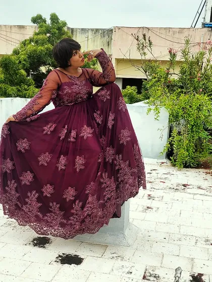 A majestic pose in the purple gown. I love feeling like a queen before I go on stage to entertain.