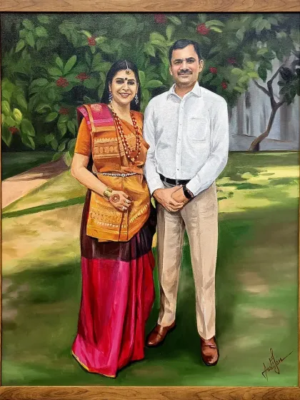 A full-length portrait of a couple, hand-painted on a 24x30 inch canvas. I worked to capture their elegant poses and the beautiful details of their traditional attire against a soft, natural background.