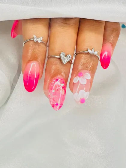 A close-up of the detail on this pink floral and glitter set. Perfect for a fun, summery vibe.