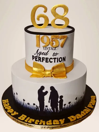 A touching silhouette cake for a 68th birthday. The design shows generations of a family and celebrates a life "Aged to Perfection" since 1957.