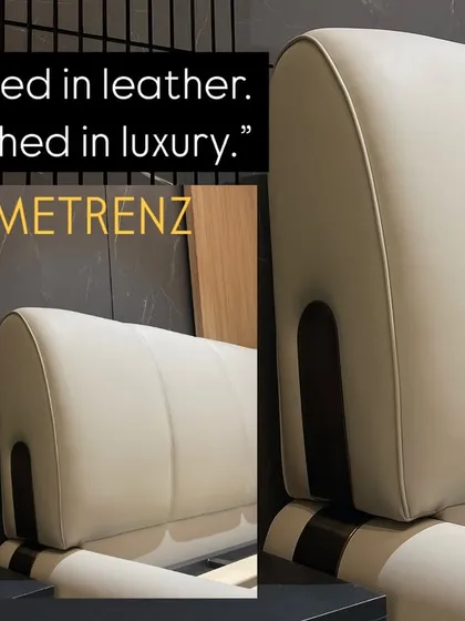 Wrapped in leather, drenched in luxury. A close-up of a custom-made bed with a plush, off-white leather headboard, showcasing the quality of my bespoke furniture.