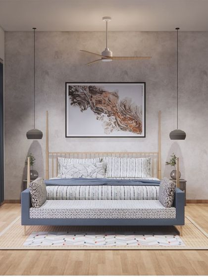 This bedroom design for a Goa retreat is both luxurious and calming. A four-poster bed, concrete-finish walls, and soft pendant lighting create a space that feels both modern and tranquil.