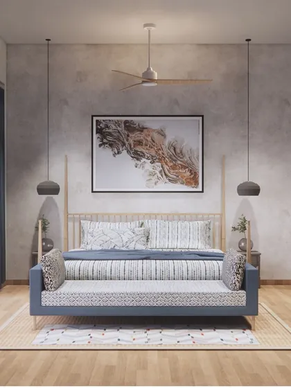 This bedroom design for a Goa retreat is both luxurious and calming. A four-poster bed, concrete-finish walls, and soft pendant lighting create a space that feels both modern and tranquil.