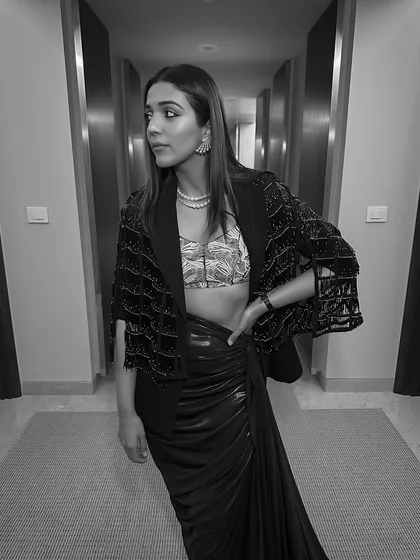 A black and white shot that captures the modern and chic vibe of this Fashion Week look. The clean lines of the makeup look just as striking in monochrome.