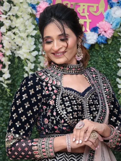 This client is dressed in a luxurious velvet lehenga. The makeup is kept soft and elegant to balance the richness of her outfit.