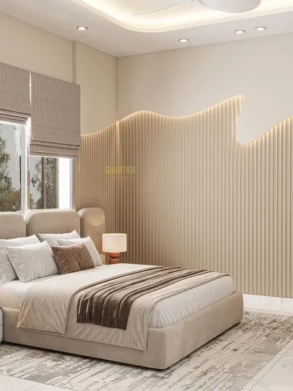 A kids' bedroom design with a unique, wavy fluted back panel behind the bed. The room is designed for functionality with a large study desk for two.