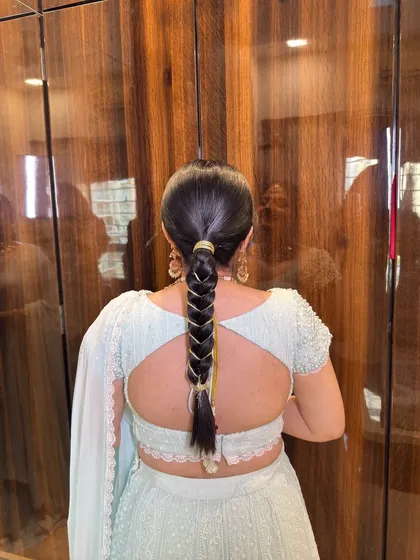 Currently running high on minimal bridal glam! This look on Lonika is perfect for a guest or bridesmaid, featuring a clean base, soft eye makeup, and a chic braided ponytail.