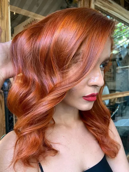 A portrait with the auburn hair. The color is so vibrant and complements her skin tone perfectly.