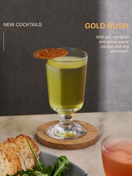 The Gold Rush, a signature gin cocktail from our new menu. It features a house-made cordial of marigold and green apple, balanced with the botanicals of gin and dry vermouth.