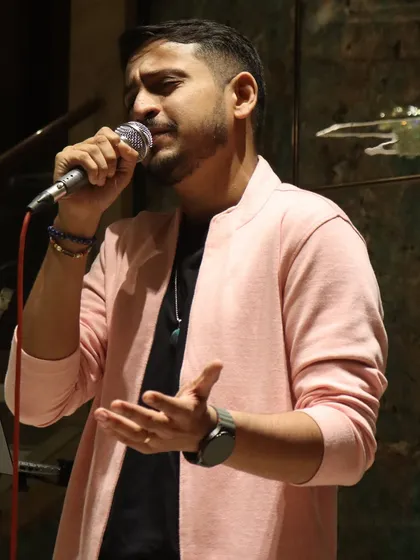 Another shot from a recent show, lost in the melody. Every performance is a chance to connect through music.