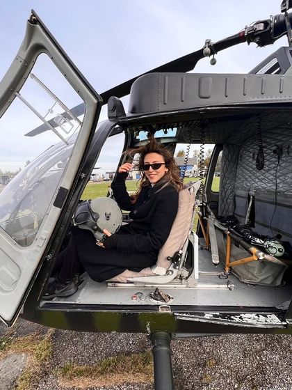 A happy moment inside the helicopter on set. It's important to find moments of joy and fun amidst the hard work of a film shoot.