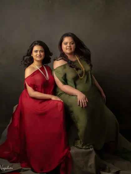 Two queens celebrating their friendship. Dressed in elegant gowns, these two incredible women radiate confidence and the power of female friendship.