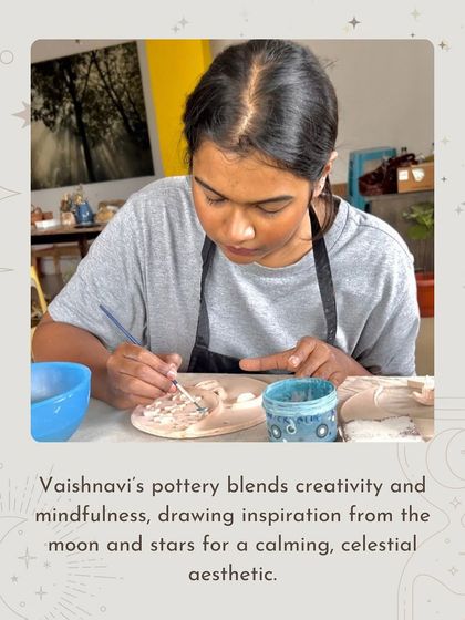 A photo of Vaishnavi at work, blending creativity and mindfulness in her celestial-inspired pottery.
