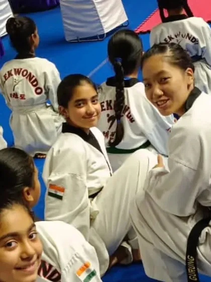 Our taekwondo students take a break during the 3rd International Taekwondo Championship. Competing in an event with participants from six countries is a fantastic opportunity for growth and exposure.