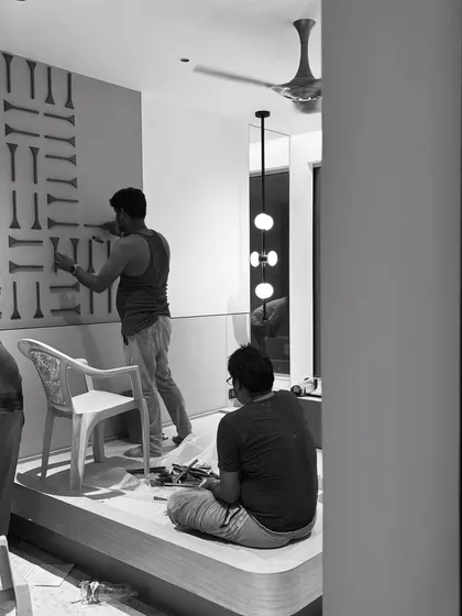 The 3D wall panel being installed. These behind-the-scenes moments show the effort and precision that go into creating our designs.