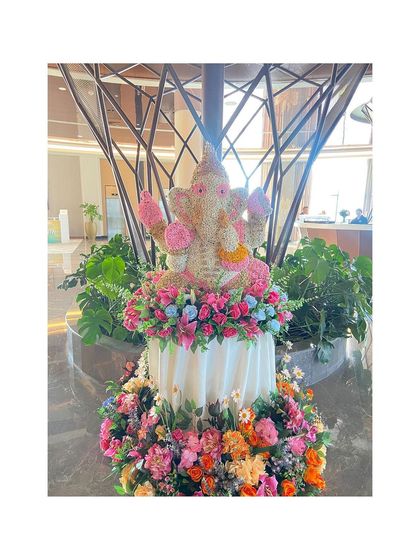 The magnificent floral Ganesha sculpture we created for a wedding in Turkey. It was handmade by Indian thermocol artists and adorned with thousands of miniature artificial flowers.