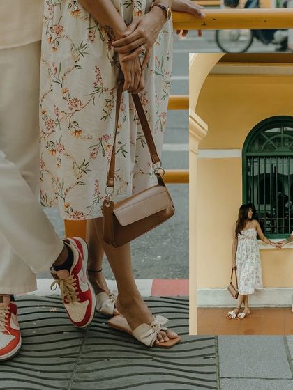 A detail shot combined with a wider view tells a story. This composition from their post-wedding shoot in Old Town Phuket highlights their style against the charming local architecture.