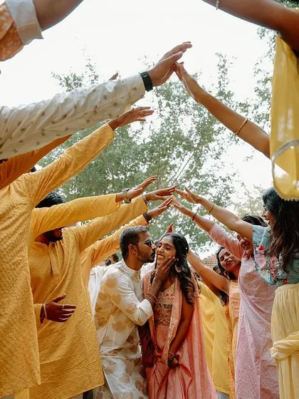 The energy of a Haldi ceremony is infectious. Surrounded by friends and family, this moment is pure, unadulterated fun. We capture the chaos and the color, preserving the vibrant memories of your celebration.