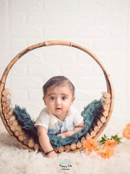 Look who's sitting up. We capture these important milestones with simple, clean setups that keep the focus on your baby's latest achievement.