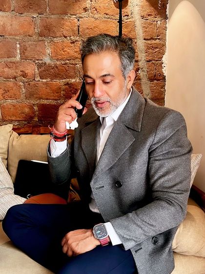 Taking an important call. A significant part of my day is spent in direct communication with clients, counsels, and my team, ensuring every aspect of a case is meticulously managed.