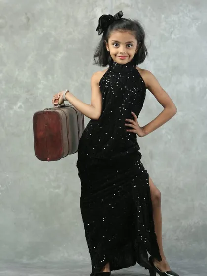 A creative and professional portfolio shot from a 7-year-old participant for our kids' modeling competition.