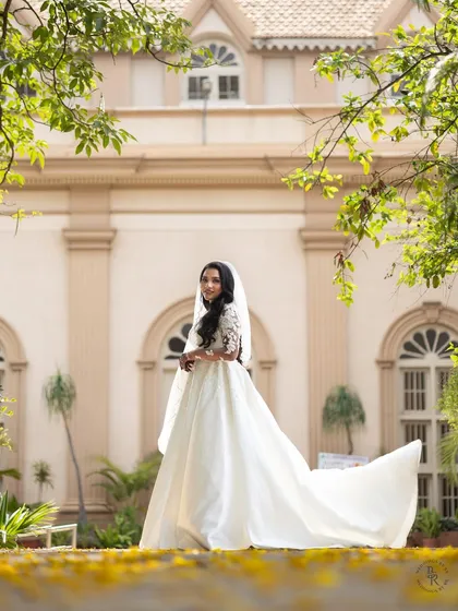 A bride in her serene moment before walking down the aisle. I focus on capturing the quiet elegance and anticipation that makes Christian weddings so beautiful.