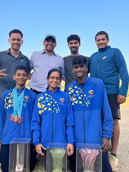 My individual championship winners Devaj, Eekisha, and Harshal, along with their coaches, at the 45th YMCA meet.