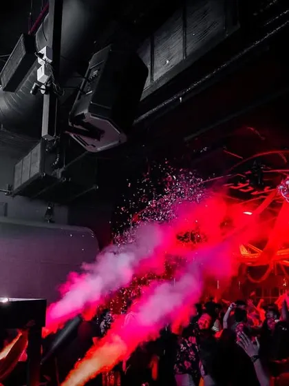 Triggering the CO2 cannons to hype up the dance floor at Warehouse Cafe.