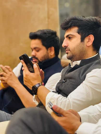 My colleagues and I, all focused on our work. Dedication is a shared value in my team.