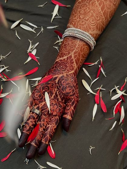 I love how a dark henna stain looks against the skin. This close-up shows the beautiful contrast and the crispness of the floral design after the color has fully matured.