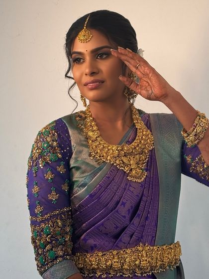 My beautiful bride Abi looking confident and striking for her reception. The colourful eye makeup and glowing skin demonstrate how to play with colour on dusky skin tones for a modern look.