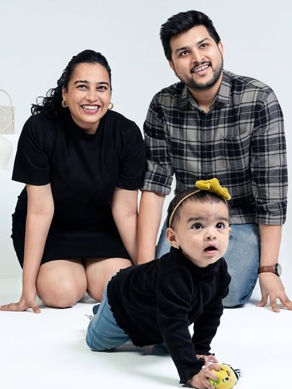 This photo, taken a year later, shows how much Gauri has grown. Paired with the newborn photo, it creates a powerful "then and now" story of our family's first year.