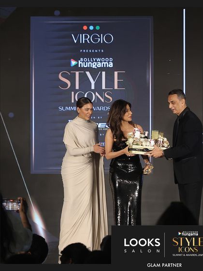 A moment on stage where my brand's contribution as a partner is recognized. It was an honor to be part of such a prestigious event celebrating style.