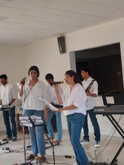 A full band rehearsal for our Social Outreach Program. We ensure our students are well prepared for their community performances, with complete sound setup including keyboards, guitars, microphones, and amps.
