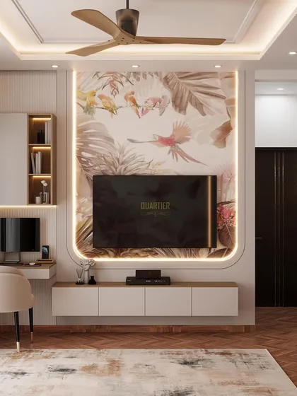 The TV unit wall of a contemporary master bedroom. The design includes a workstation and uses a beautiful floral wallpaper to add a soft, artistic touch to the room.