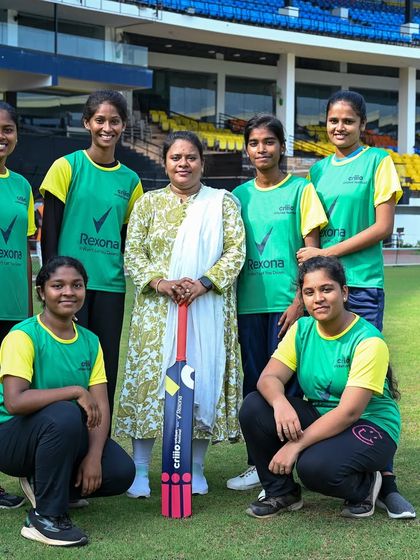 Participants of the ICC Criiio Cricket Festival pose with a custom-branded bat. We handled all branding and equipment for this initiative to elevate women's cricket in India.