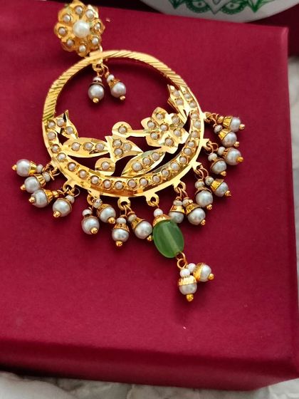 Another one of my popular pendant sets, restocked. This one features a circular design with a green stone drop, offering a classic and elegant look.