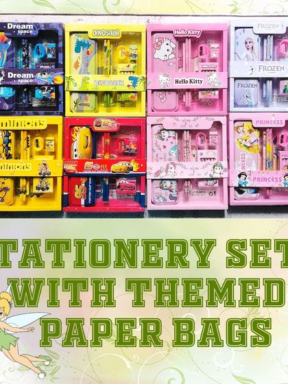 A variety of the stationery sets that were included in the Tinkerbell party favors, with themes like space, dinosaurs, Hello Kitty, and princesses.