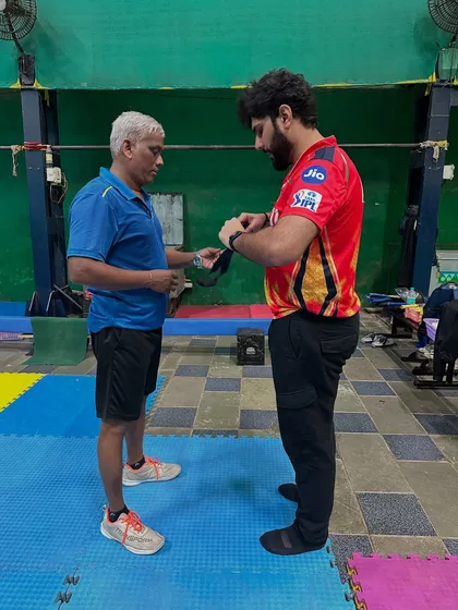 One of our coaches getting fitted with a Firstbeat monitoring device. Our coaching staff also uses this technology to optimize their own training and better guide our students.