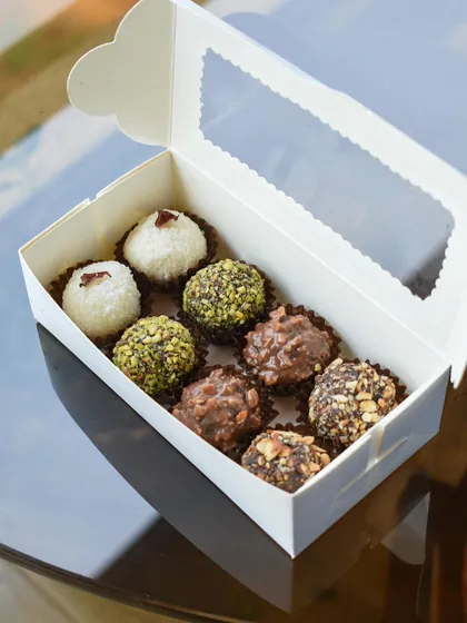 A small but mighty gift box featuring an assortment of my most popular truffle flavors. It's a perfect, bite-sized token of appreciation for colleagues or friends during the festive season.