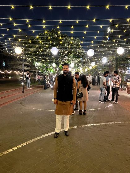 Standing under a canopy of lights at night. Life is fleeting; a moment of rest, and a new day dawns.