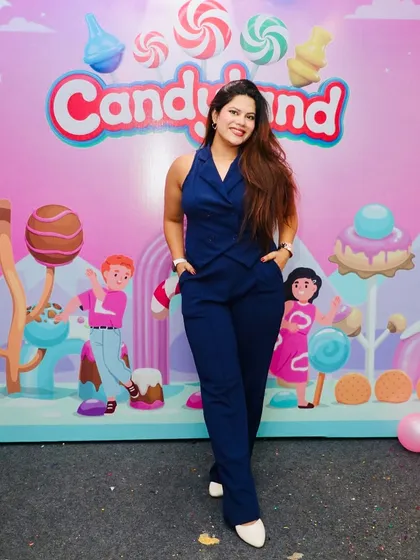 Another pose from the 'Candyland' event. A versatile host can adapt to any theme, from glamorous weddings to fun corporate parties.