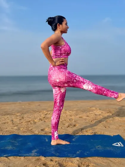 Yoga is one of the best ways to strengthen mind and body. Here I am practicing a standing leg extension, feeling strong and focused by the ocean.