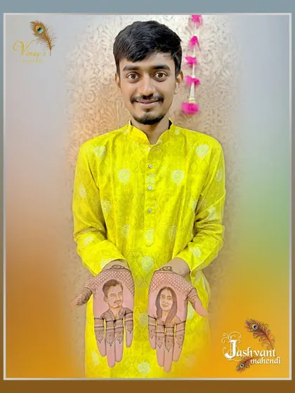 A proud groom displays his unique portrait mehndi, with a likeness of him and his partner on each palm.