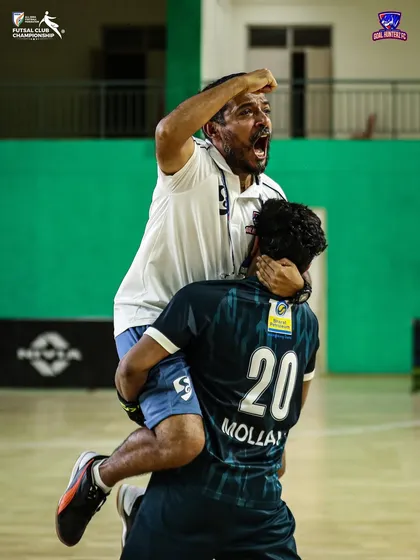 A heartfelt embrace between player and coach, a moment that captures the bond we share.